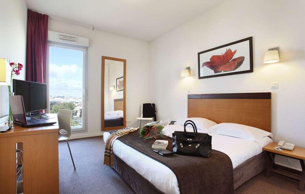Appart'Hotel Odalys City - Bioparc Lyon Est Quarto foto