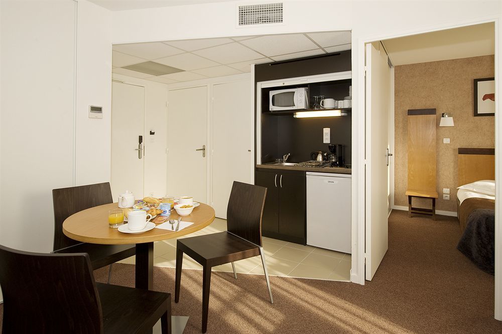 Appart'Hotel Odalys City - Bioparc Lyon Est Quarto foto